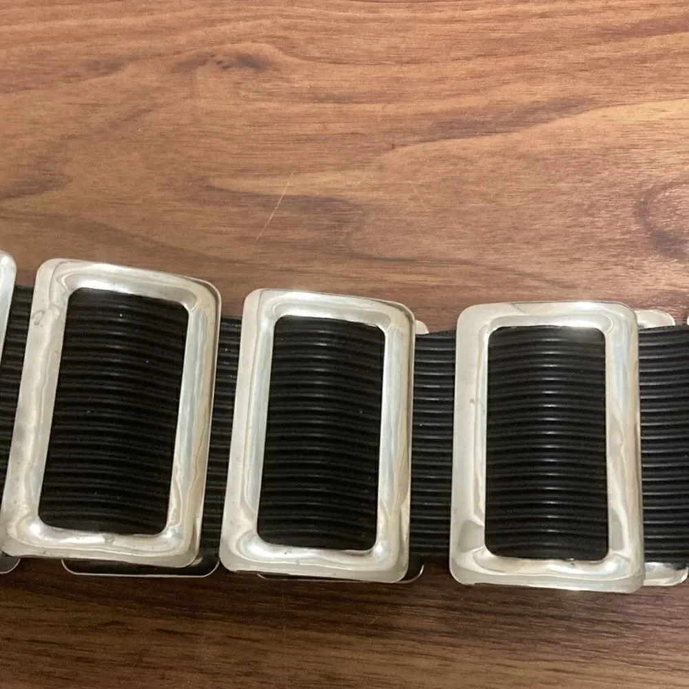 Thick Belt Made From Striated Black Rubber &  Silver Tone Metal Rectangles.